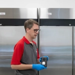Pestconnect optix product with colleague