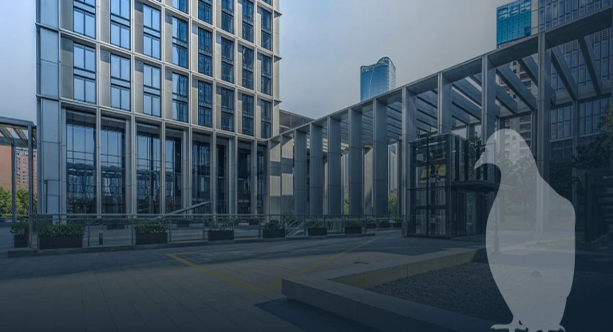 bird image overlaid on picture of an office building